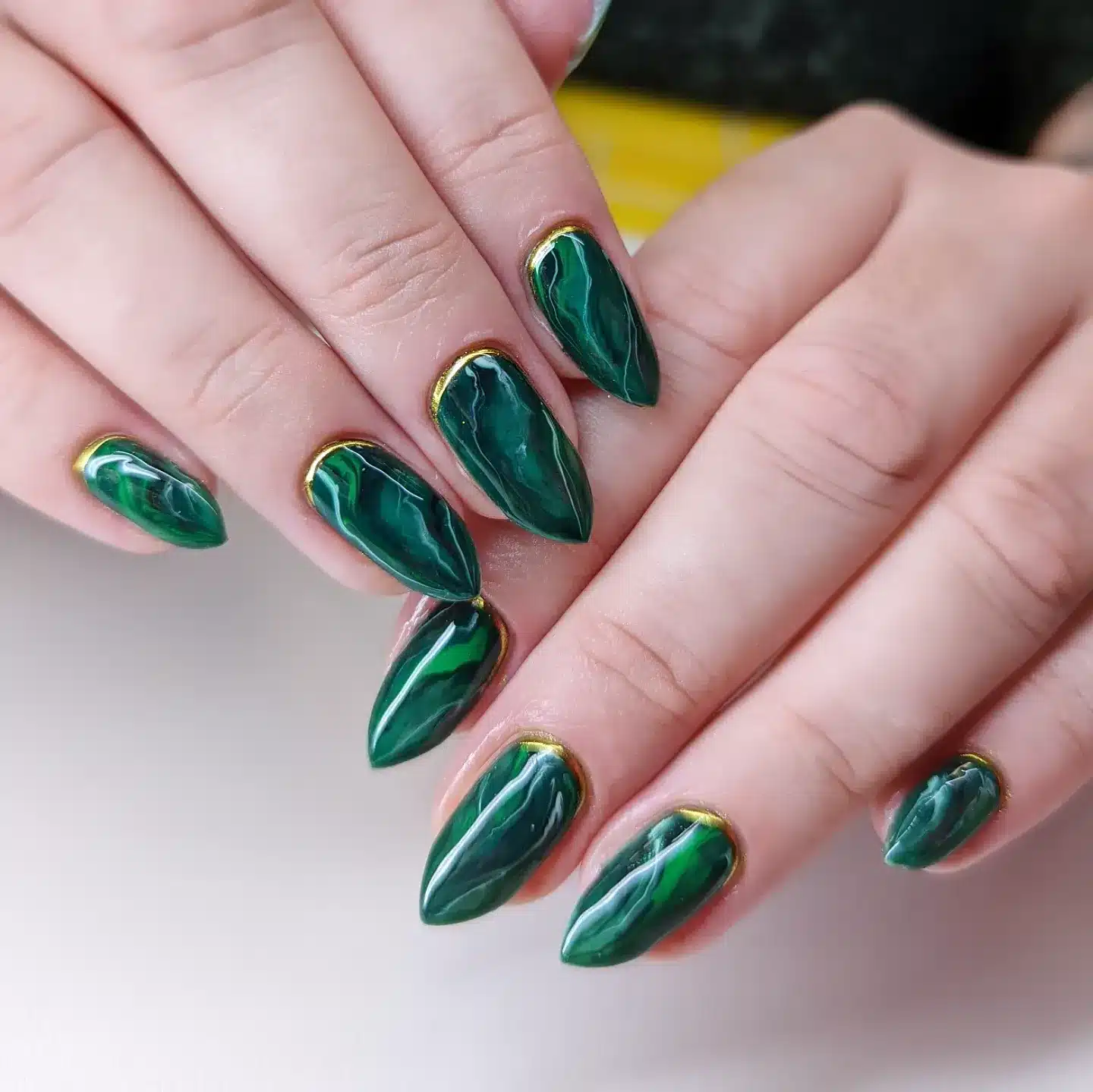 16. Emerald Green Marble Almond Nails - elegant nail art ideas