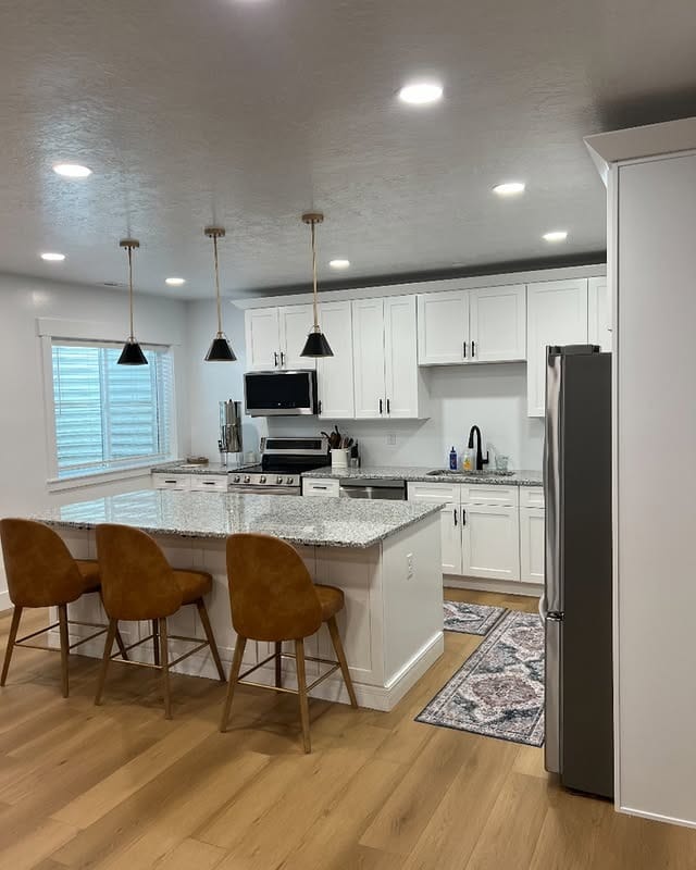 3. White Basement Kitchen with Warm Wood Accent Ideas - basement kitchen ideas
