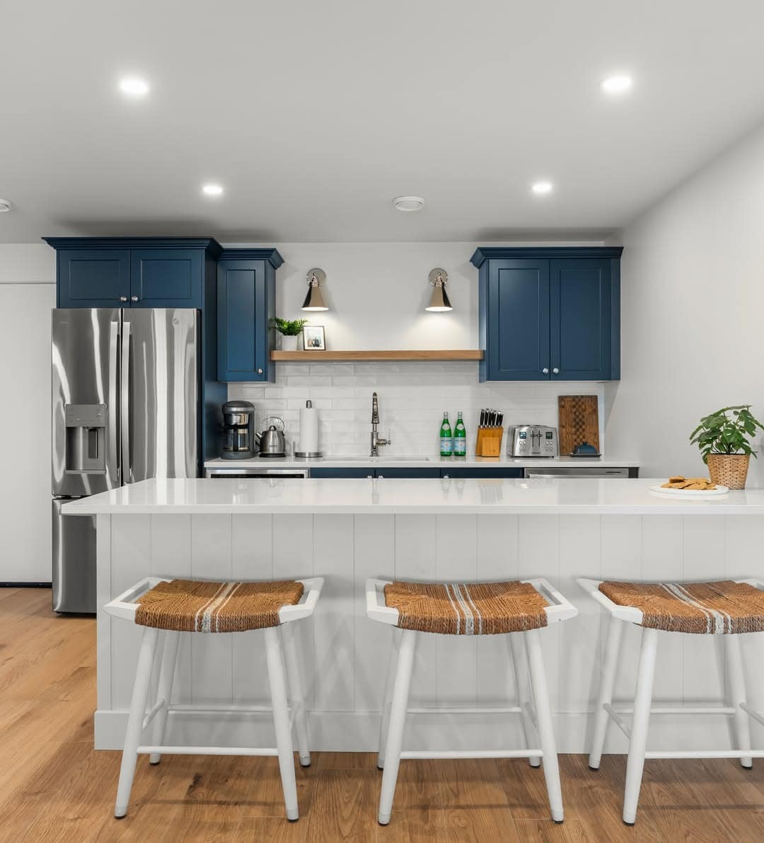 5. Blue and White Basement Kitchen with Coastal Style - basement kitchen ideas