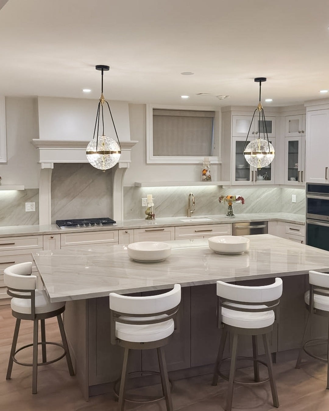 8. Gray and White Basement Kitchen with Marble Island - basement kitchen ideas