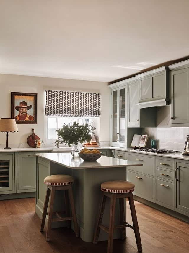 12. Sage Green Basement Kitchen with Classic Island - basement kitchen ideas