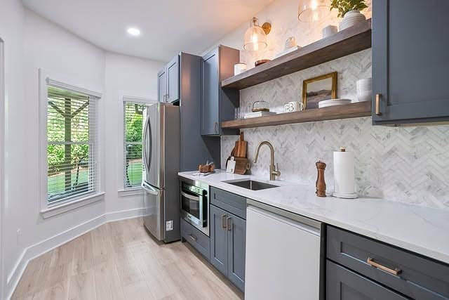 18. Blue Gray Basement Kitchen with Open Shelving - basement kitchen ideas