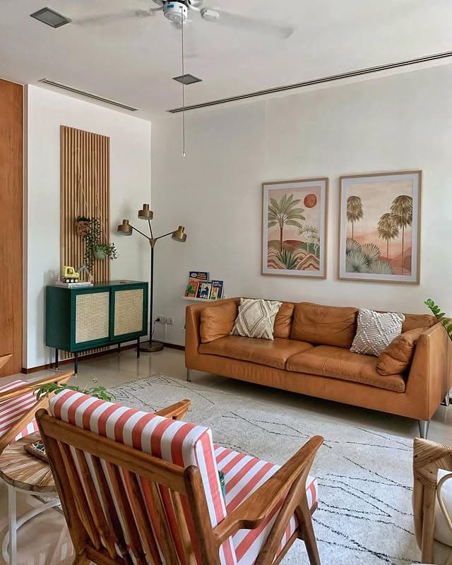 6. Tan Leather Retro Living Room Ideas With Tropical Decor - retro living room ideas