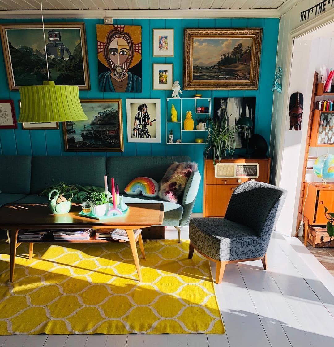 9. Teal Retro Living Room Ideas With Colorful Gallery Wall - retro living room ideas