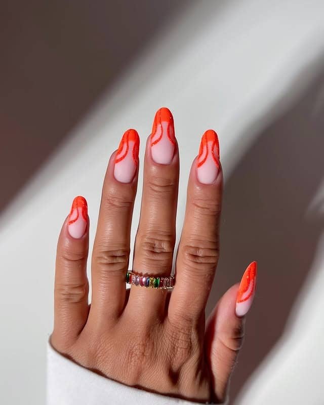 7. Neon Orange Flame French Nails - neon nail ideas