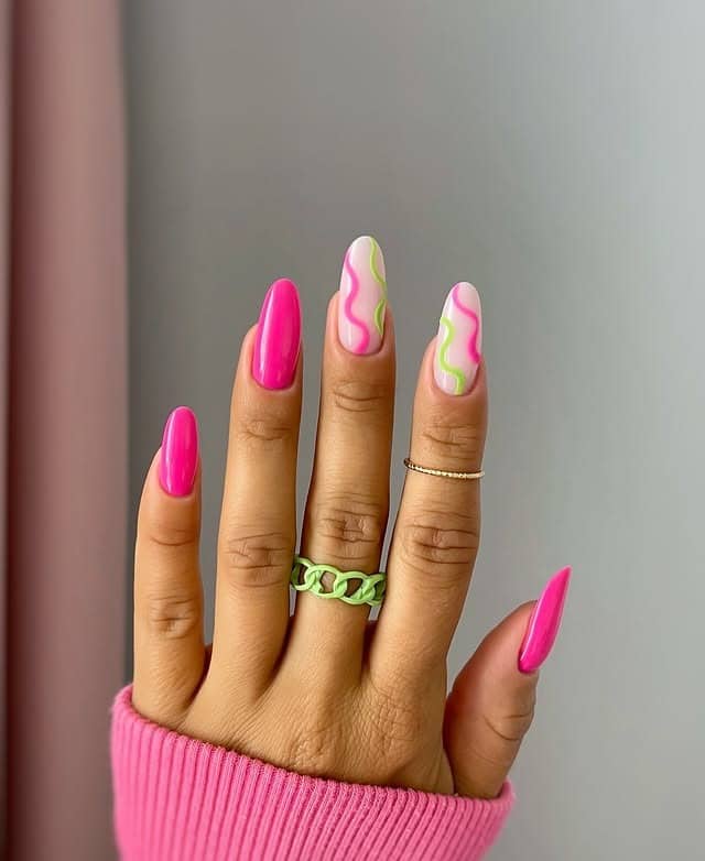 15. Neon Pink and Green Wavy Almond Nails - neon nail ideas