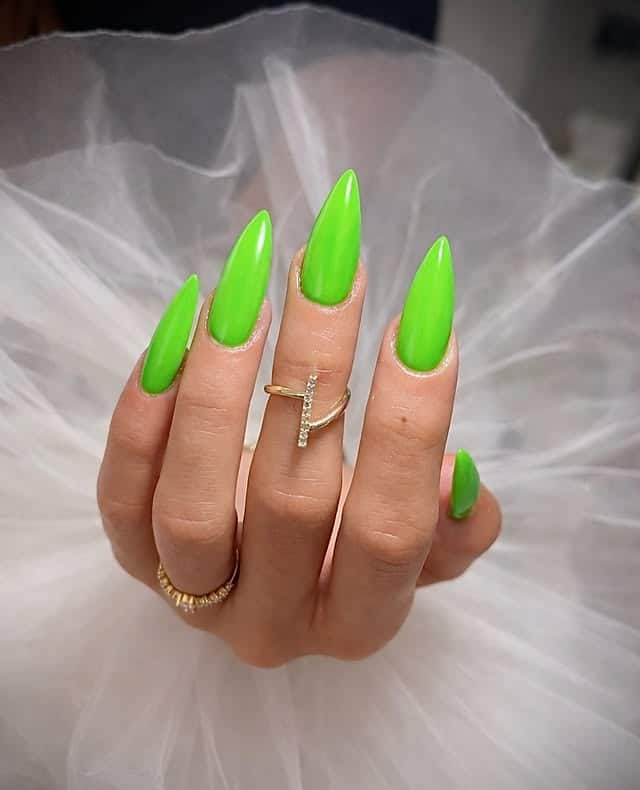17. Neon Green Glossy Stiletto Nails - neon nail ideas