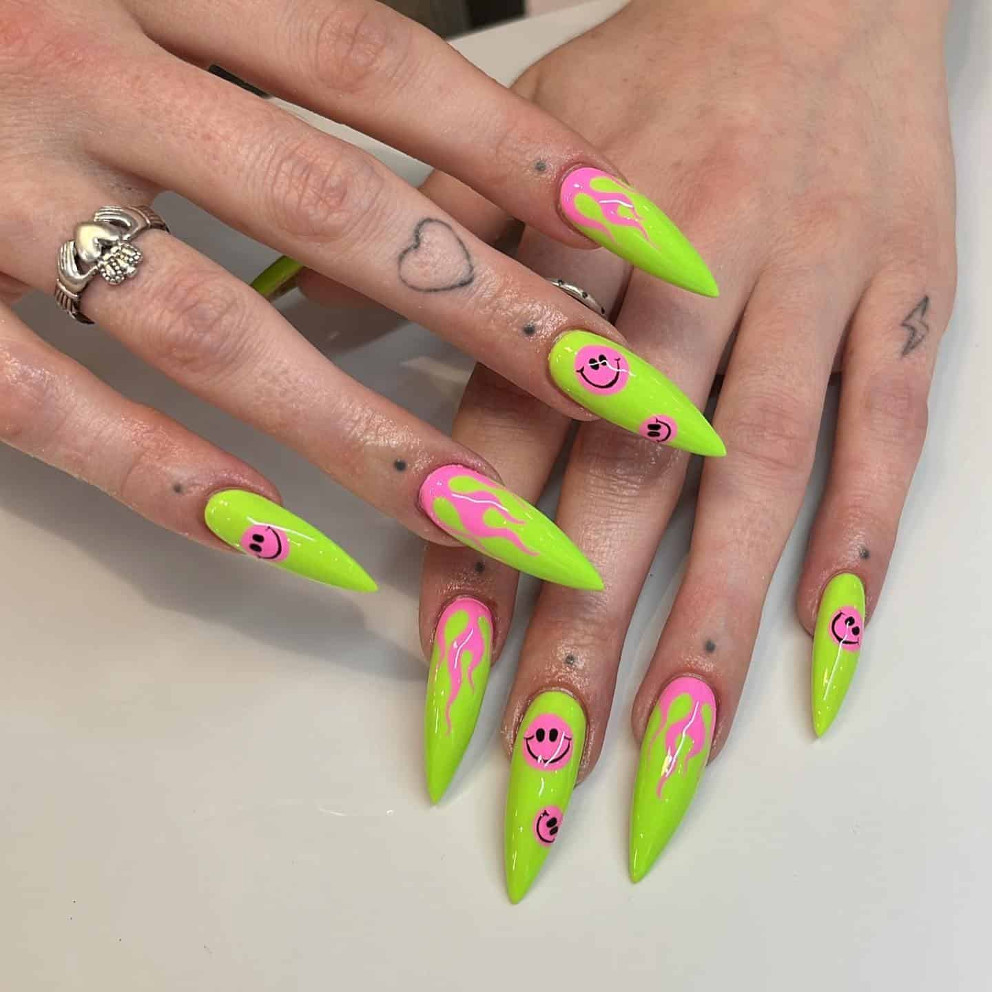 19. Neon Green and Pink Smiley Stiletto Nails - neon nail ideas