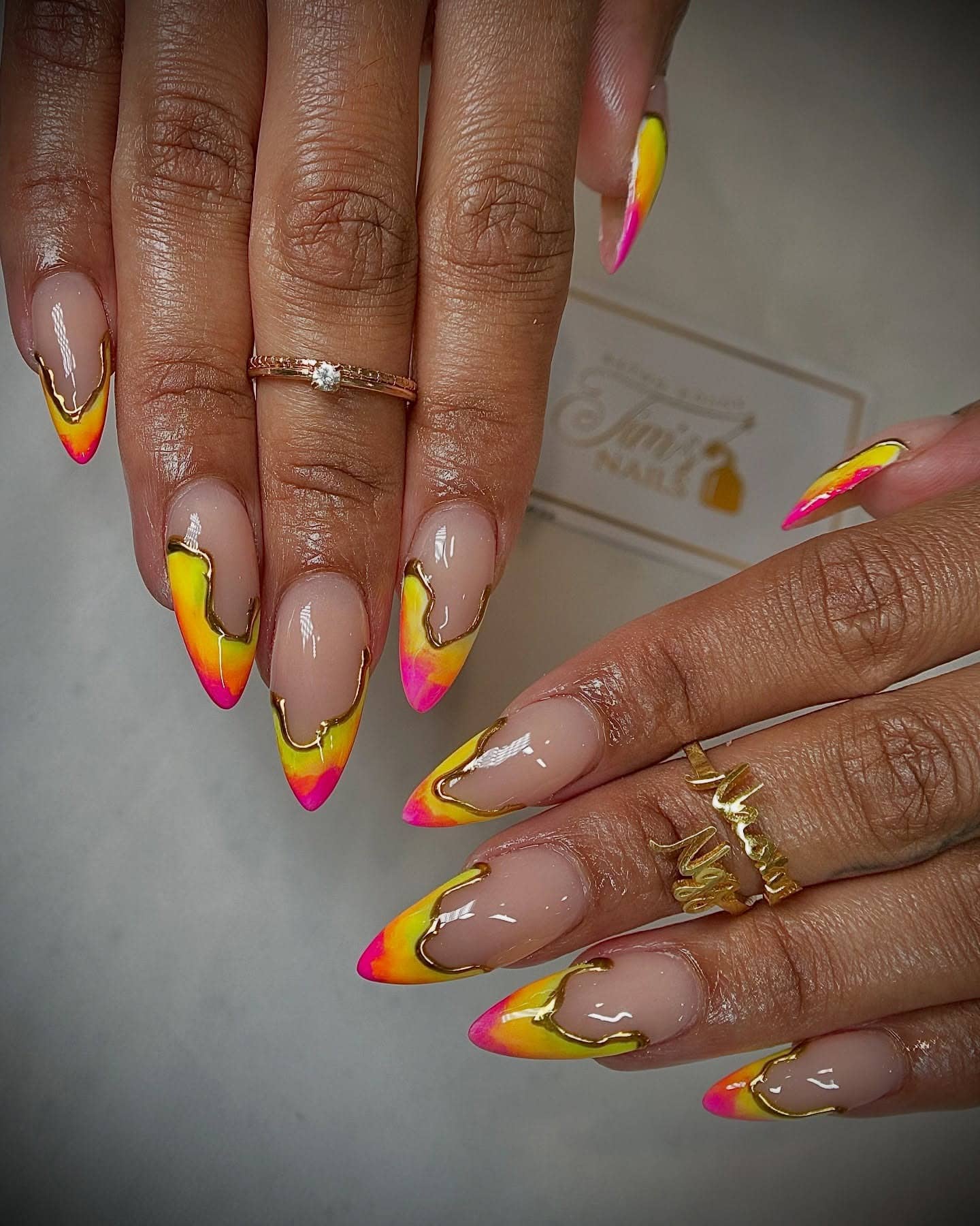 20. Neon Sunset French Almond Nails with Gold Outline - neon nail ideas