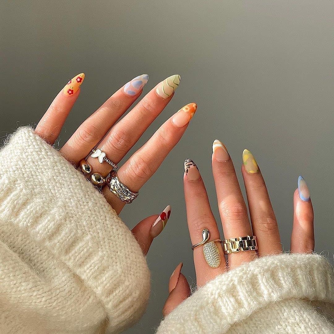 2. Pastel Abstract Oval Nail Art - oval nail ideas