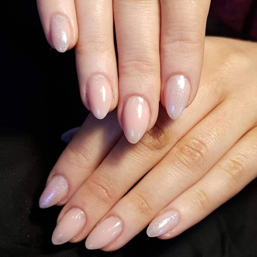 9. Blush Pink Pearl Accent Oval Nails - oval nail ideas