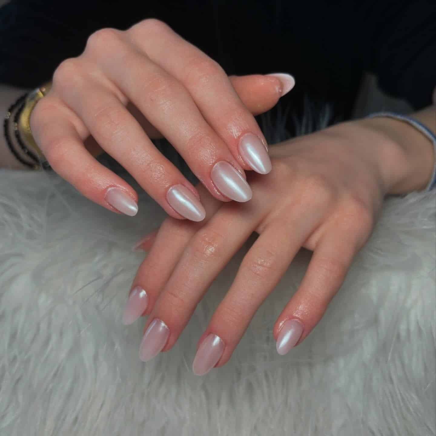 10. Pearlescent Milky White Oval Nails - oval nail ideas
