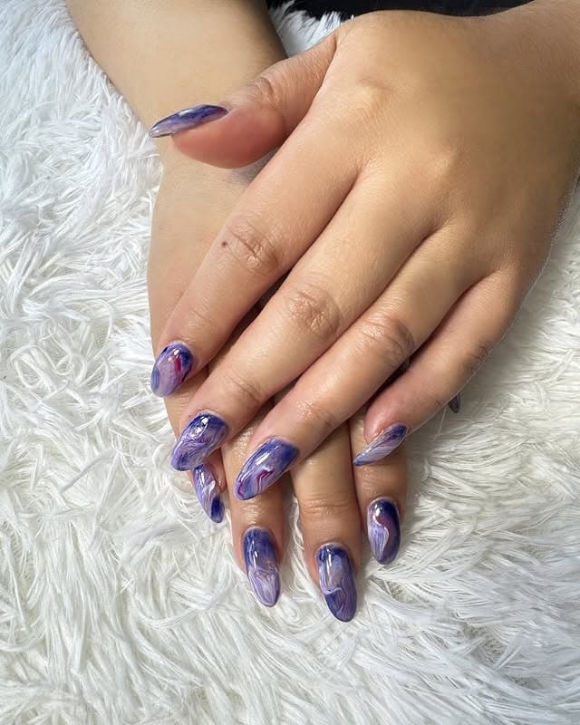 12. Purple Marble Oval Nails - oval nail ideas