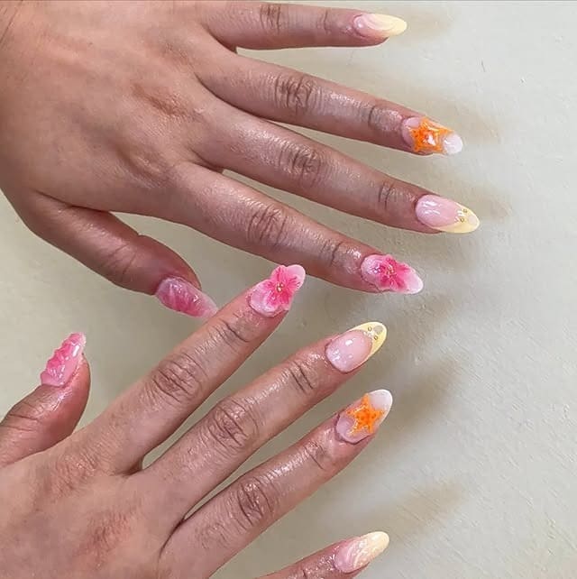 19. Floral Peach French Tip Oval Nails - oval nail ideas