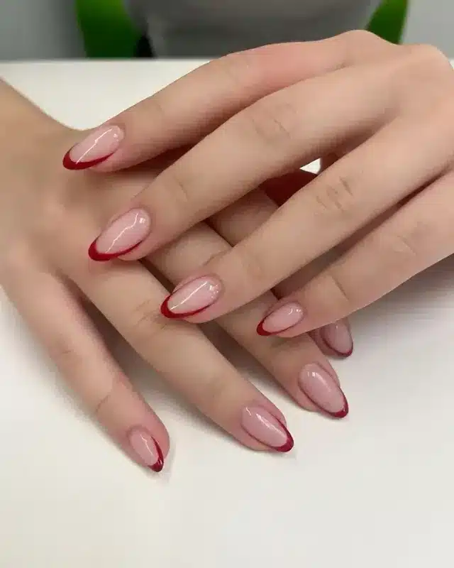 21. Red French Tip Oval Nails - oval nail ideas