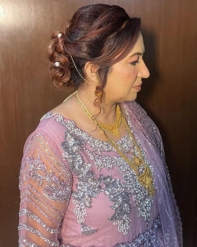 6. Auburn Brown Twisted Messy Bun with Pearl Pins - Messy Bun Hairstyles