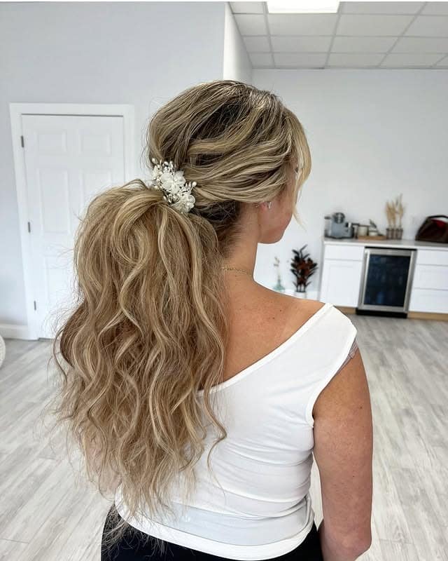8. Fluffy Low Ponytail with Sandy Blonde Balayage - Fluffy Hairstyles