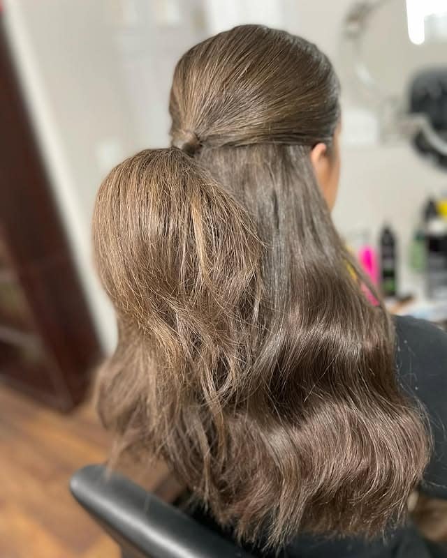 10. Fluffy Half Up Ponytail with Cool Medium Brown Hair - Fluffy Hairstyles