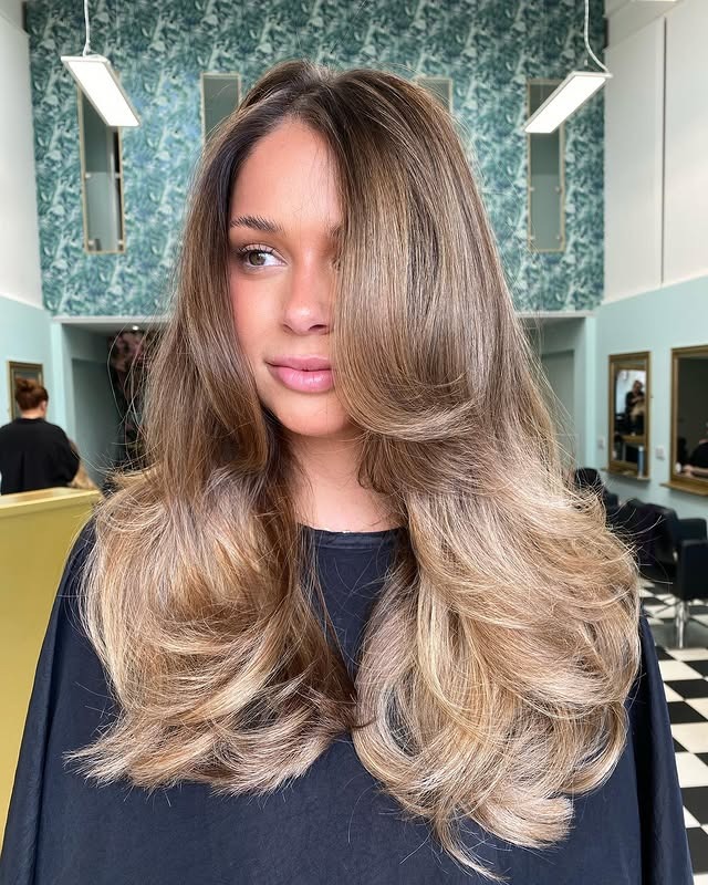 11. Fluffy Butterfly Layers with Beige Blonde Balayage - Fluffy Hairstyles
