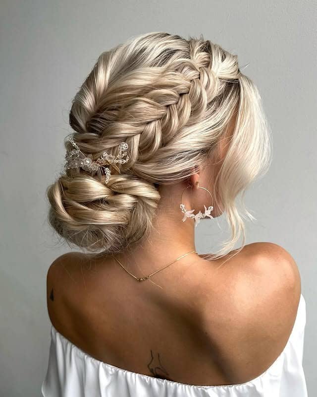 18. Fluffy Braided Low Bun with Icy Blonde Hair - Fluffy Hairstyles