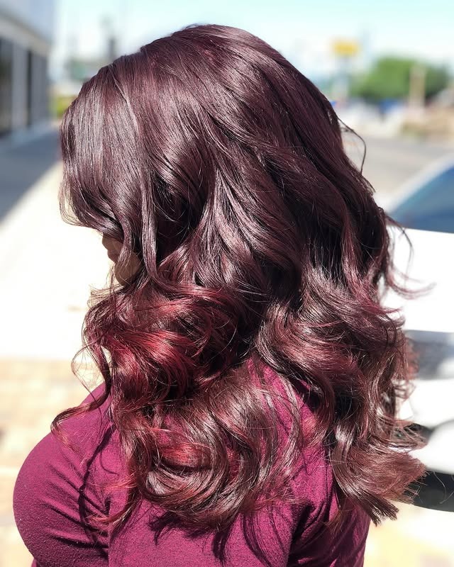 2. Deep Burgundy Layered Curls - Deep Burgundy Hair Color