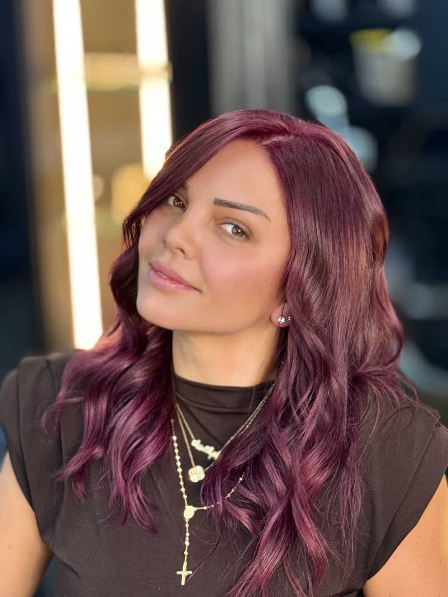 8. Deep Burgundy Medium Wavy Hairstyle - Deep Burgundy Hair Color