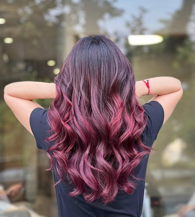 12. Deep Burgundy Balayage Long Waves - Deep Burgundy Hair Color