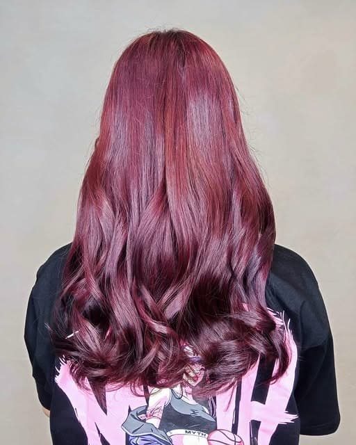 16. Deep Burgundy Long Curled Layers - Deep Burgundy Hair Color