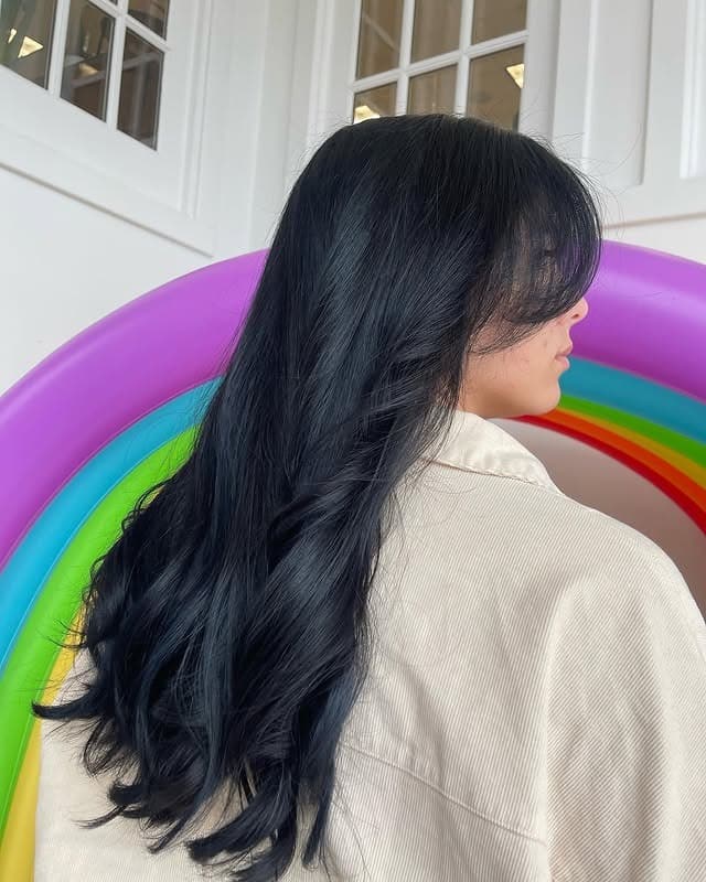 8. Long Layered Blue Black Blowout - Blue Black Hair Color