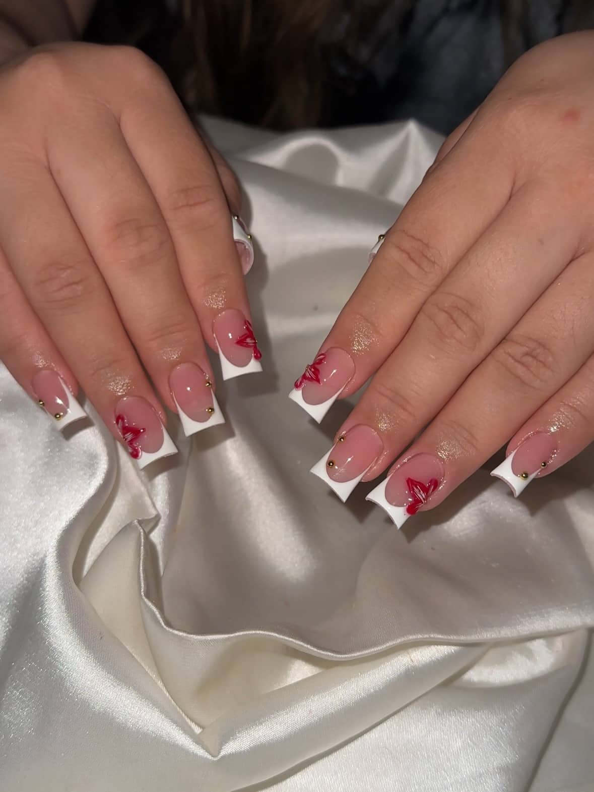1. White French Tip Nails with Red Bow Art - short square nail ideas
