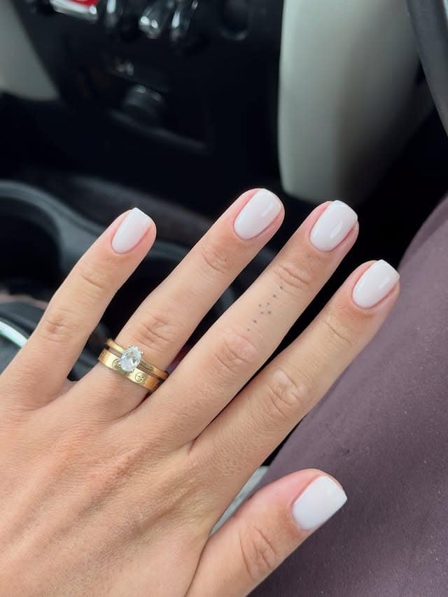 18. Glossy Milky White Short Square Nails - short square nail ideas