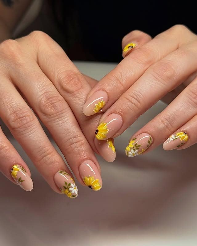 5. Minimalist Nude Sunflower Accent Nails - sunflower nail ideas