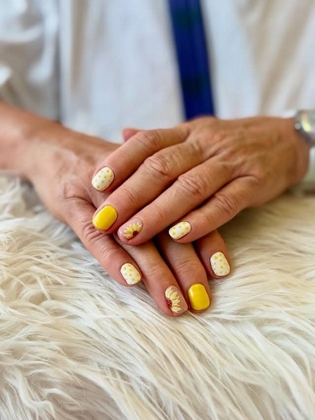 16. Short Yellow Polka Dot Sunflower Nails - sunflower nail ideas