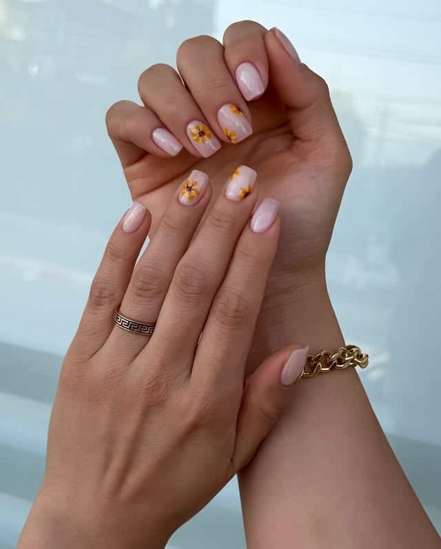 17. Soft Pink Square Sunflower Accent Nails - sunflower nail ideas