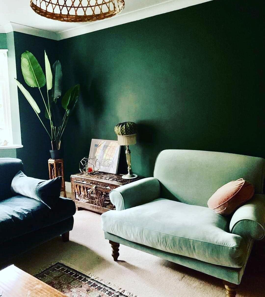 13. Dark Green Living Room with Sage Green Seating - dark green living room ideas