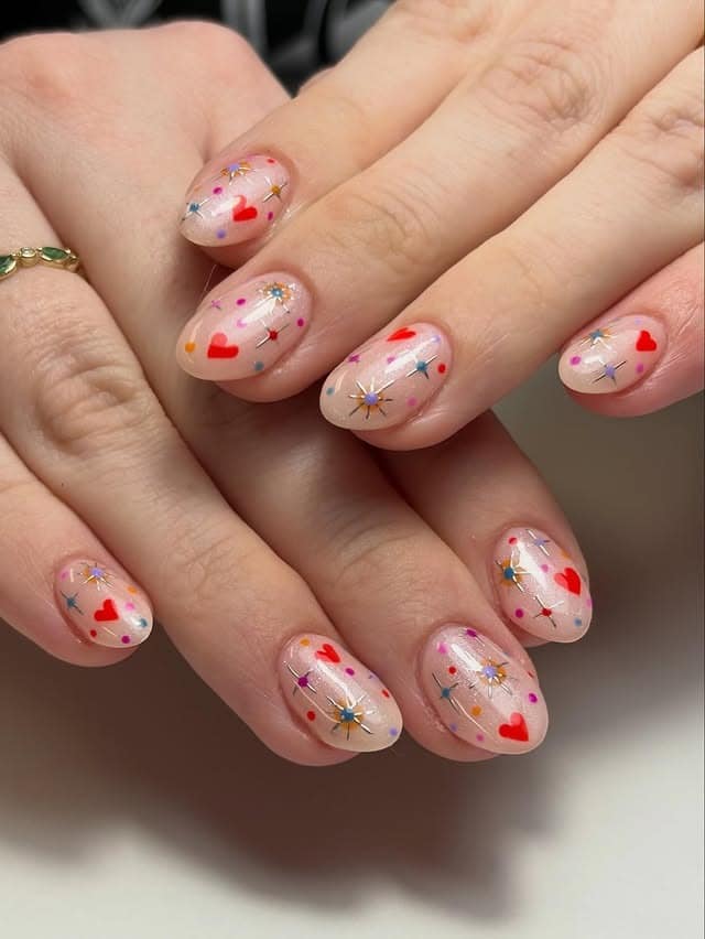 14. Confetti Heart Short Oval Nails - valentine's day nail ideas