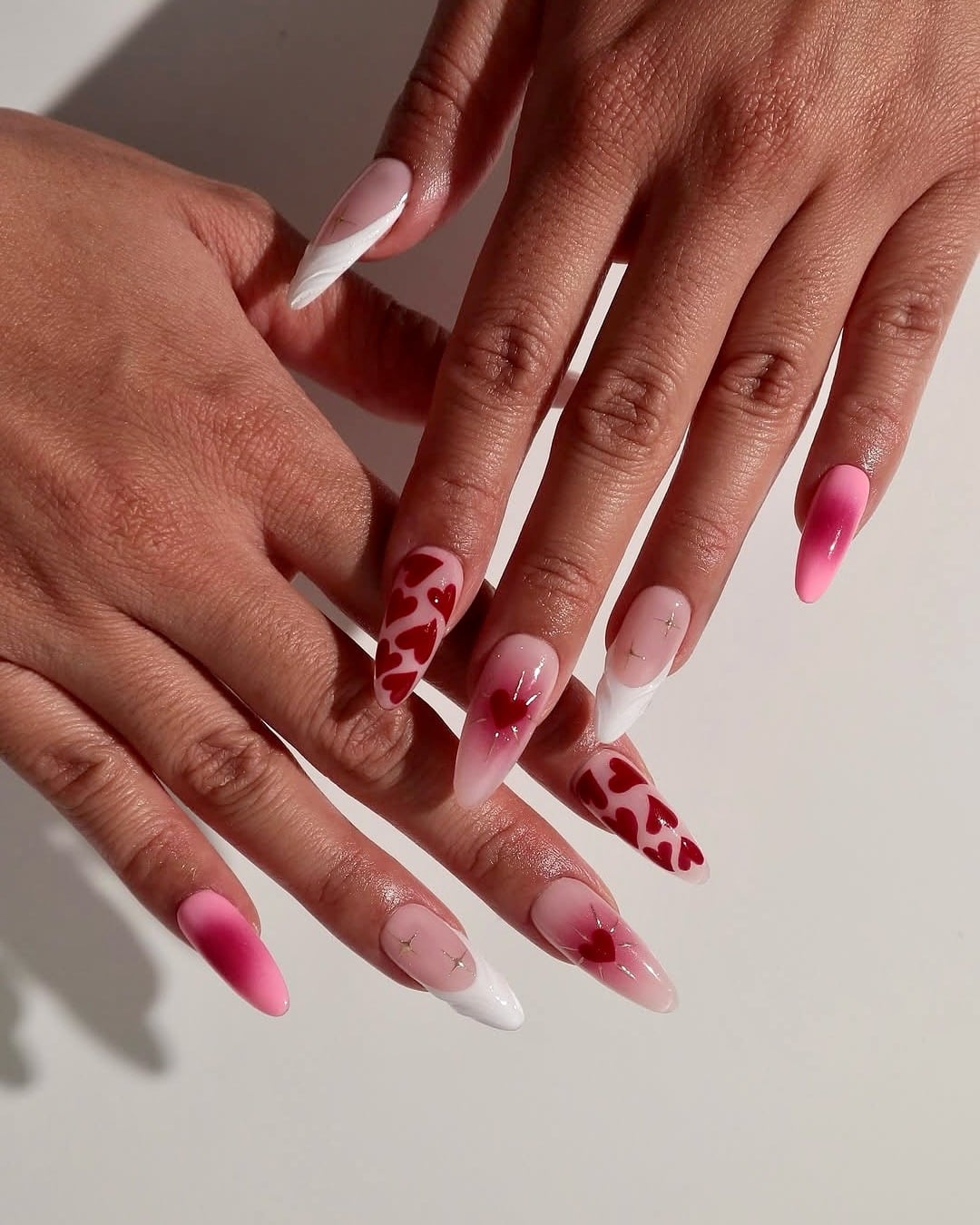 21. Pink Ombre Heart Almond Nails - valentine's day nail ideas