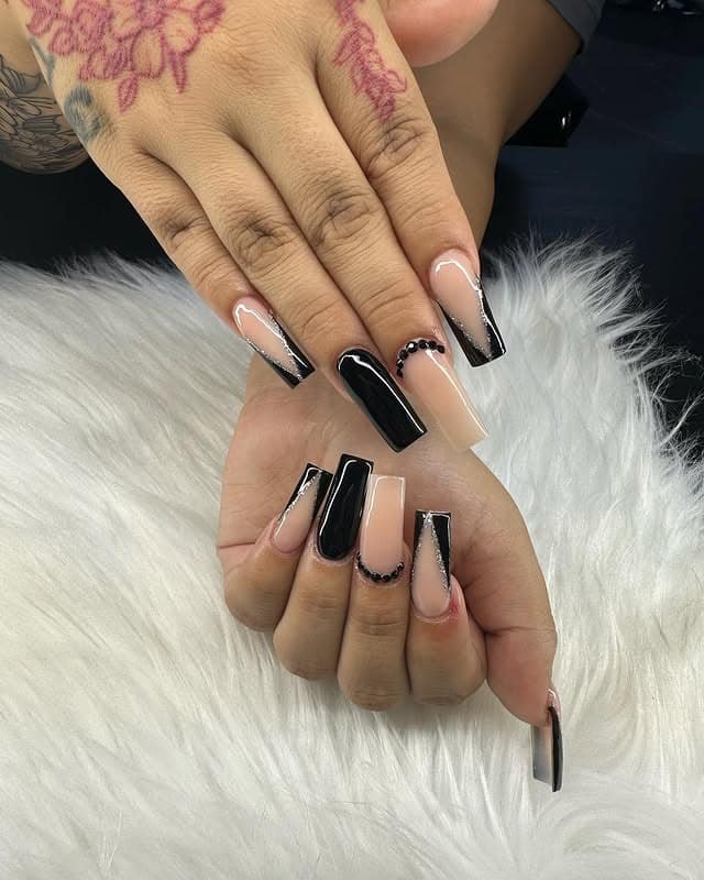 2. Black and Nude Coffin Nails with Rhinestone Details - classy black nail ideas