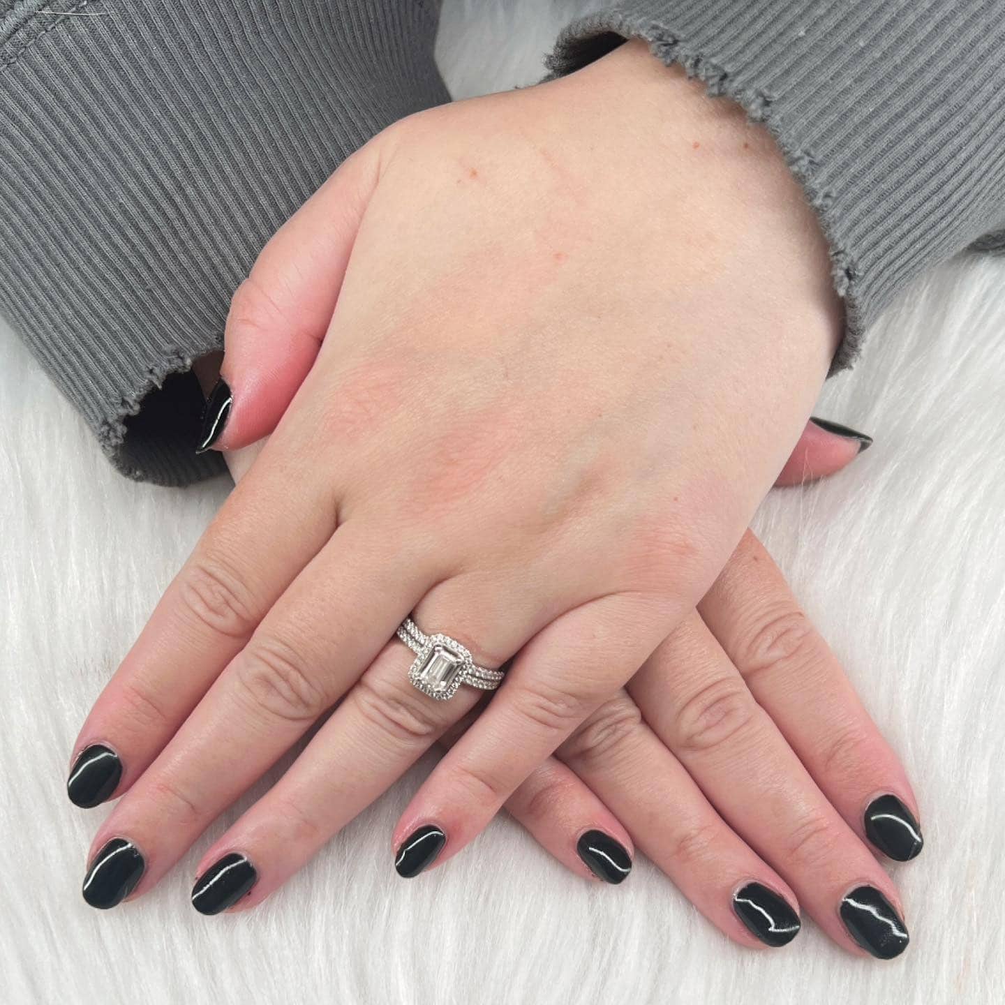3. Glossy Short Black Oval Nails - classy black nail ideas