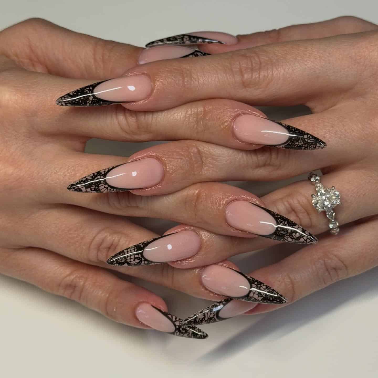 7. Black Lace French Stiletto Nails - classy black nail ideas