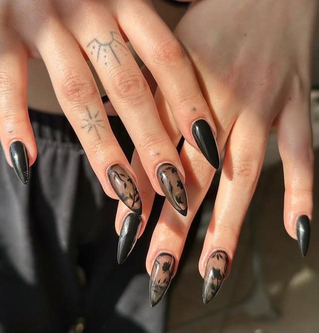 8. Black Botanical Almond Nails - classy black nail ideas