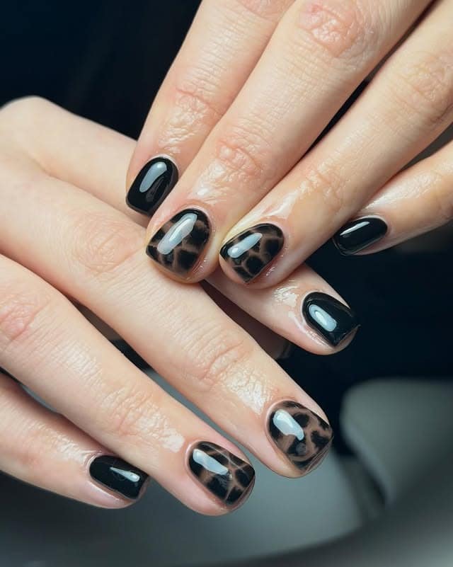10. Black Tortoiseshell Short Nails - classy black nail ideas