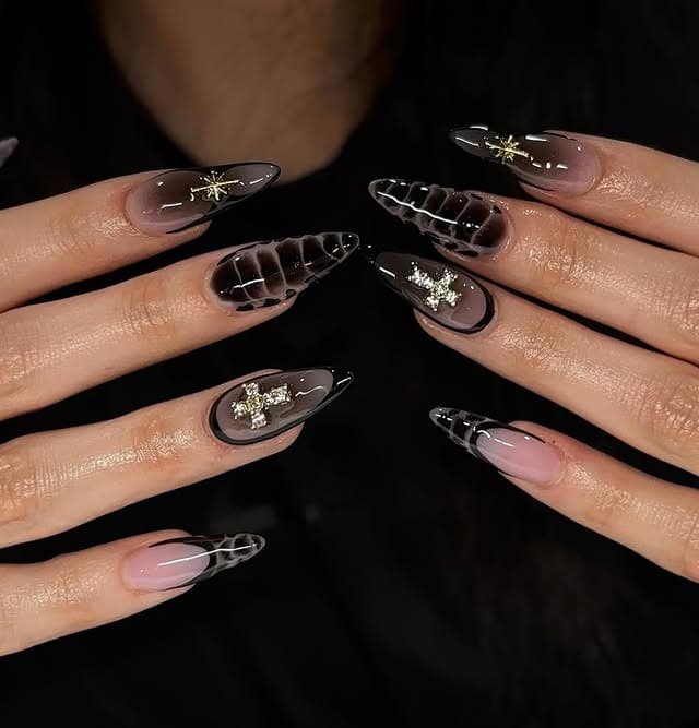 16. Black Smoky Aura Almond Nails with Gold Charms - classy black nail ideas