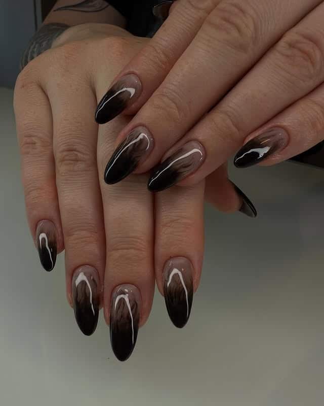 20. Black Smoky Ombre Almond Nails - classy black nail ideas