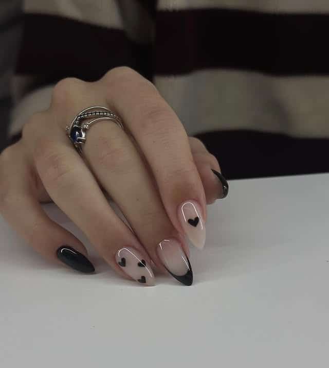 21. Black French Almond Nails with Heart Accents - classy black nail ideas