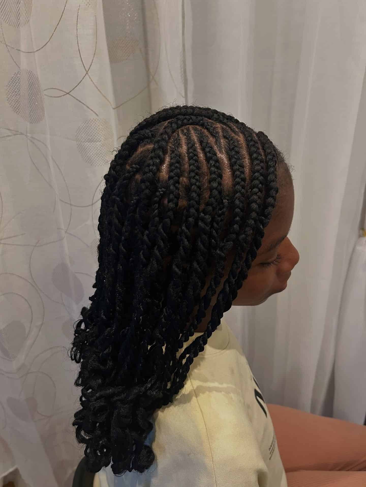 16. Medium Black Twist Braids with Curled Ends - Twist Braid Hairstyles