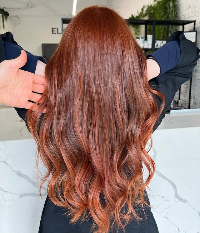 3. Layered Copper Red Balayage Waves - Red Copper Hair Color