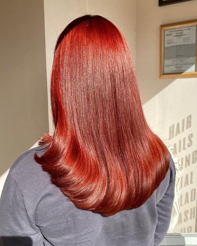 4. Glossy Crimson Red Copper Blowout - Red Copper Hair Color