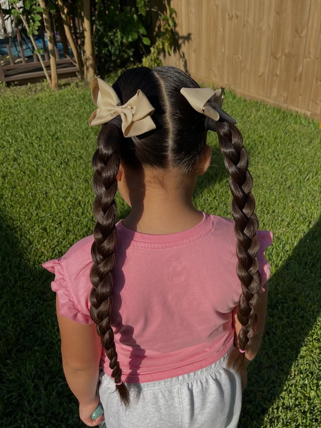 11. Double Rope Braids with Jet Black Hair - Hairstyles For School