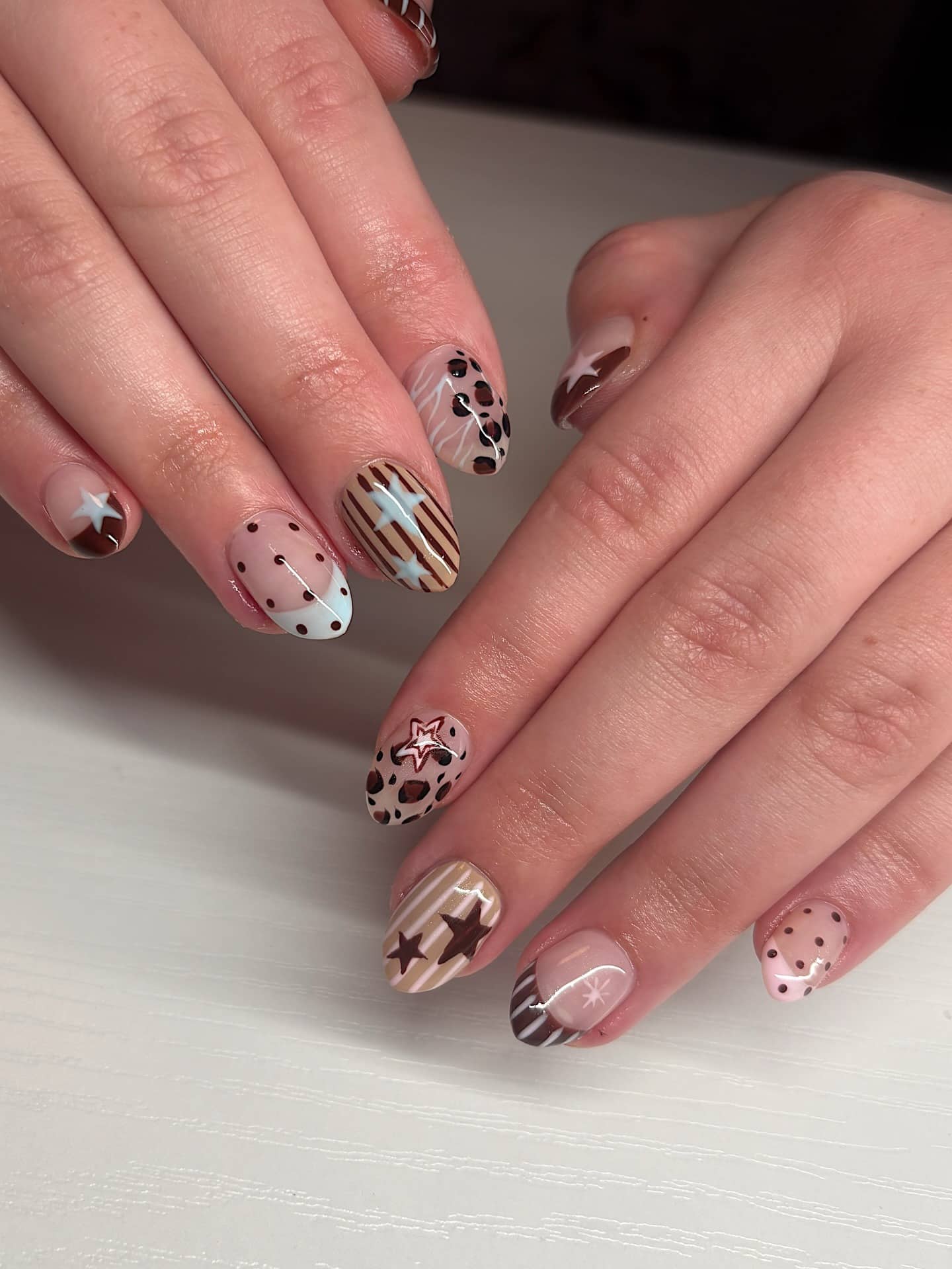 15. Brown Retro Mixed Pattern Short Nails - cute and easy nail ideas